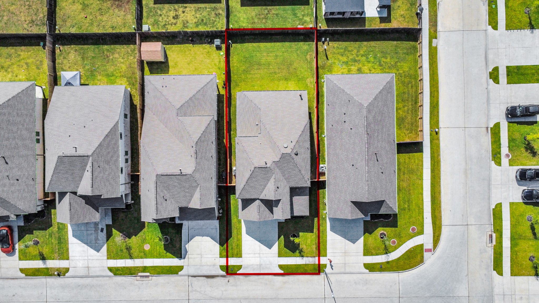 14606 Surfbird Lane Houston, TX 77049 - Photo 5 of 45 An aerial view of a spacious subdivision lot, highlighting a well-maintained yard and a fully fenced perimeter, offering both privacy and expansive outdoor space.
