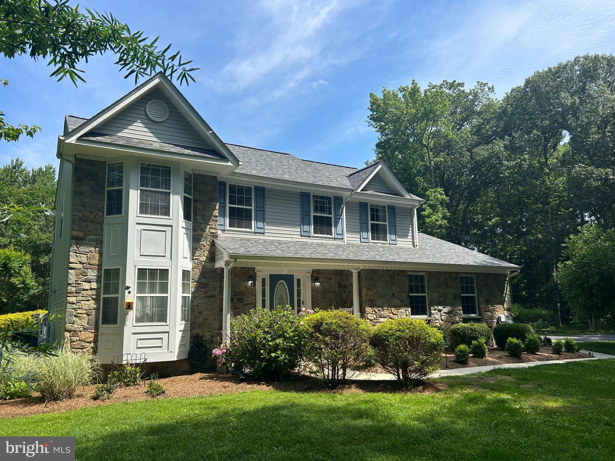 1582 Snug Road Shady Side, MD 20764 - Photo 4 of 6 Charming home nestled in lush greenery.