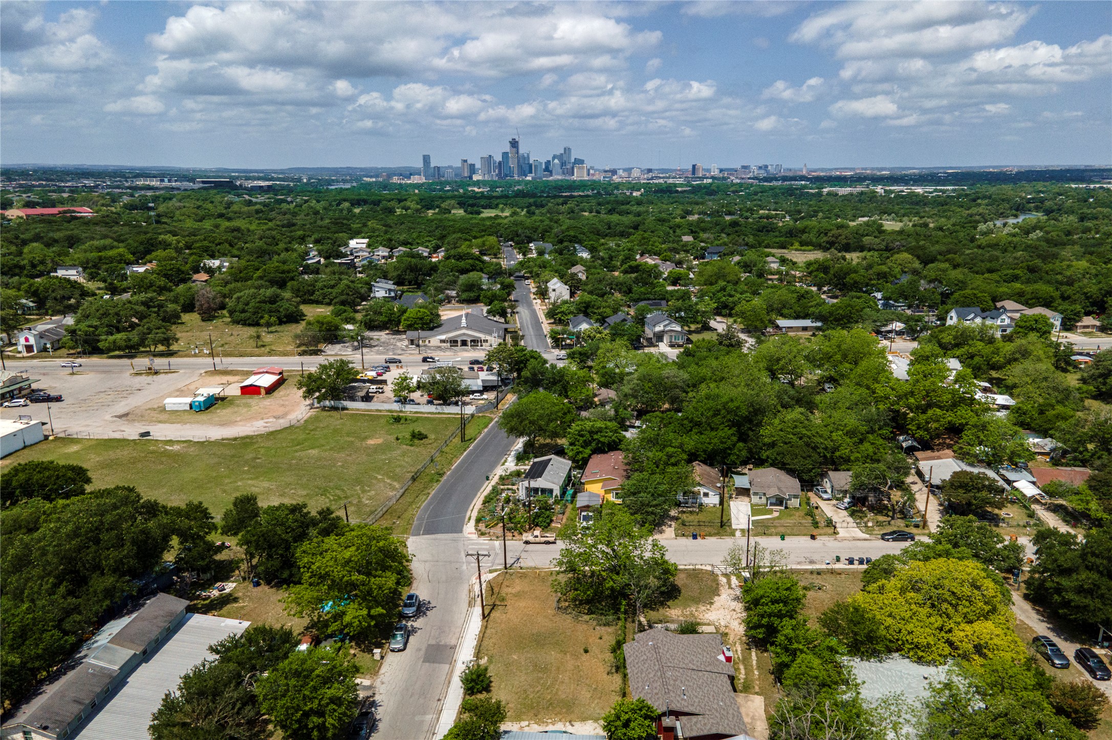 6402 Ponca Street Austin, TX 78741 - Photo 3 of 9 an aerial view of residential houses with outdoor space