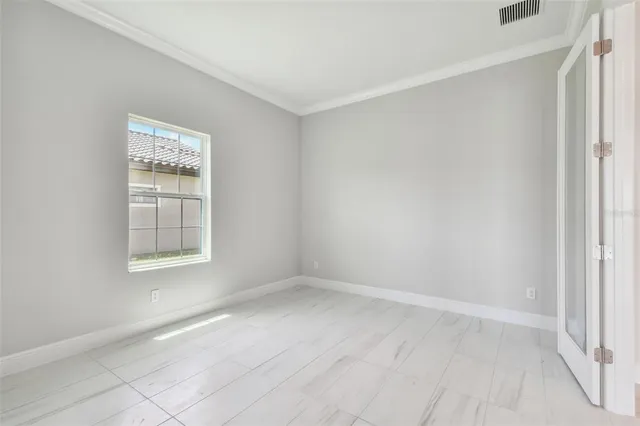 a bathroom with a sink a mirror a vanity and a shower