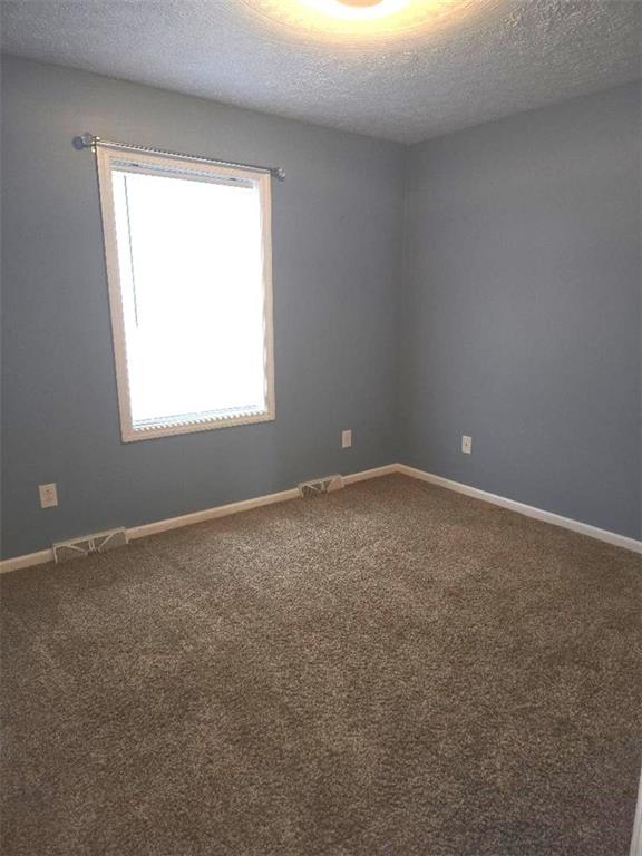 309 Shagbark Road Grindstone, PA 15442 - Photo 25 of 45 an empty room with a window