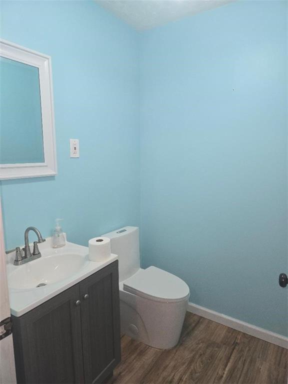 309 Shagbark Road Grindstone, PA 15442 - Photo 36 of 45 a bathroom with a toilet a sink and mirror