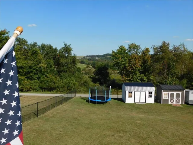 a house view with a garden space