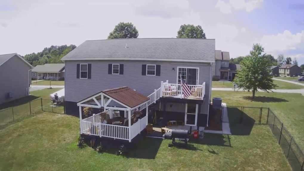 309 Shagbark Road Grindstone, PA 15442 - Photo 4 of 45 a aerial view of a house with a yard balcony and furniture