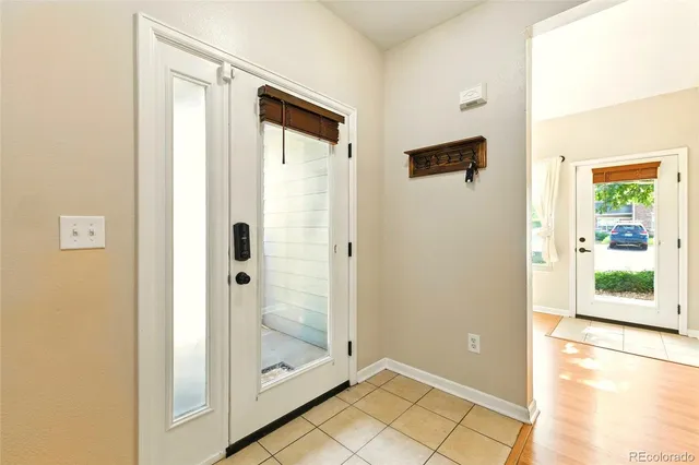 a view of a bathroom with a glass shower door