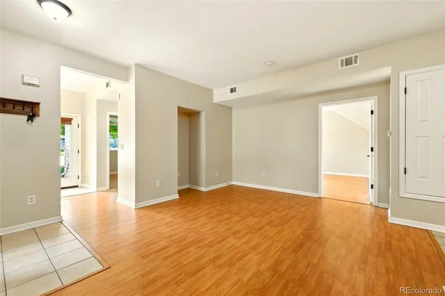 a view of a livingroom with wooden floor