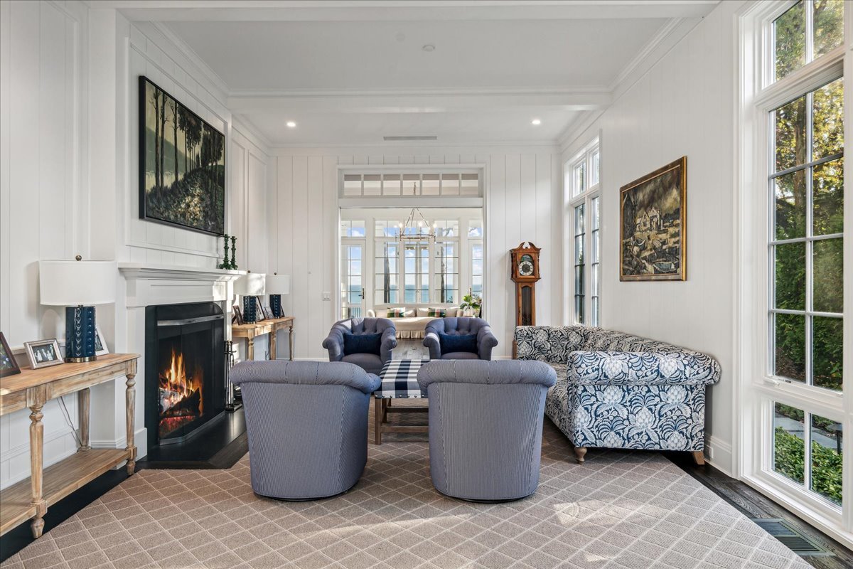 973 Sheridan Road Winnetka, IL 60093 - Photo 22 of 92 a living room with fireplace furniture and a large window