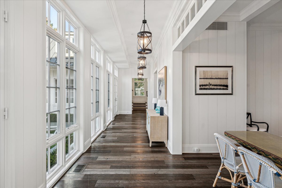 973 Sheridan Road Winnetka, IL 60093 - Photo 33 of 92 a view of a hallway with wooden floor and staircase
