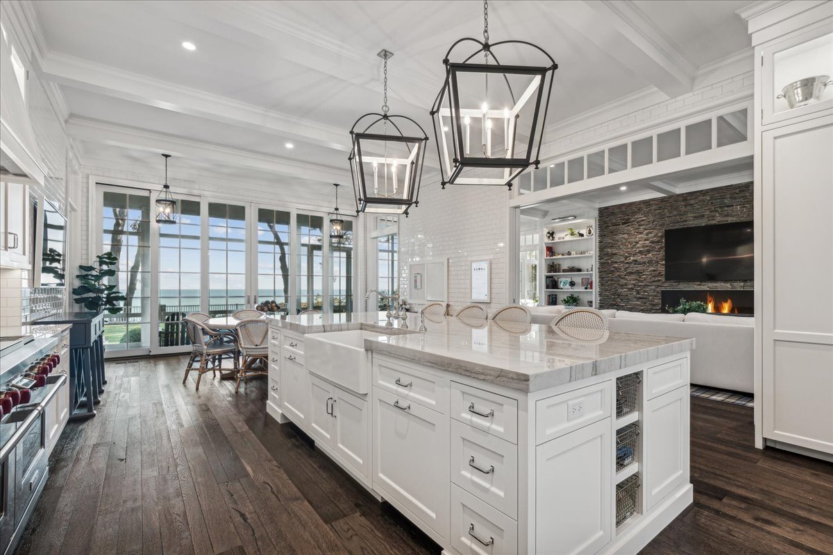 973 Sheridan Road Winnetka, IL 60093 - Photo 34 of 92 a kitchen with stainless steel appliances double vanity and a wooden floors