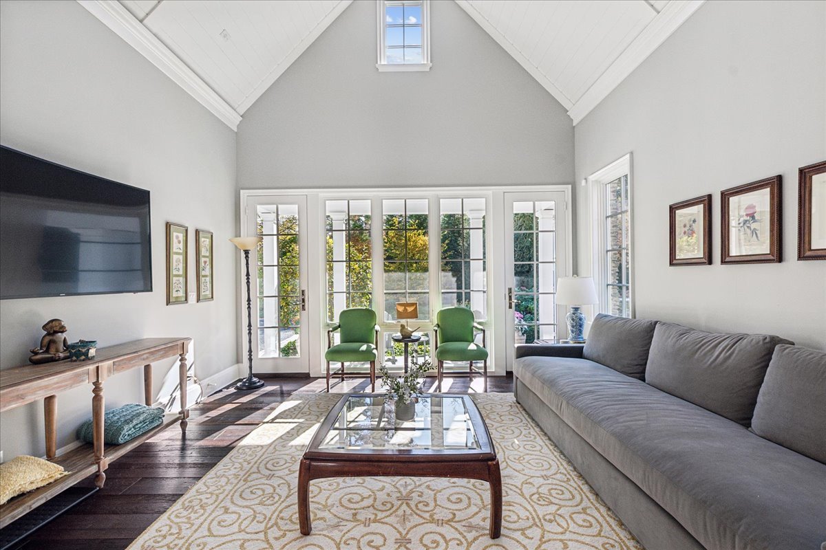 973 Sheridan Road Winnetka, IL 60093 - Photo 70 of 92 a living room with furniture and a flat screen tv