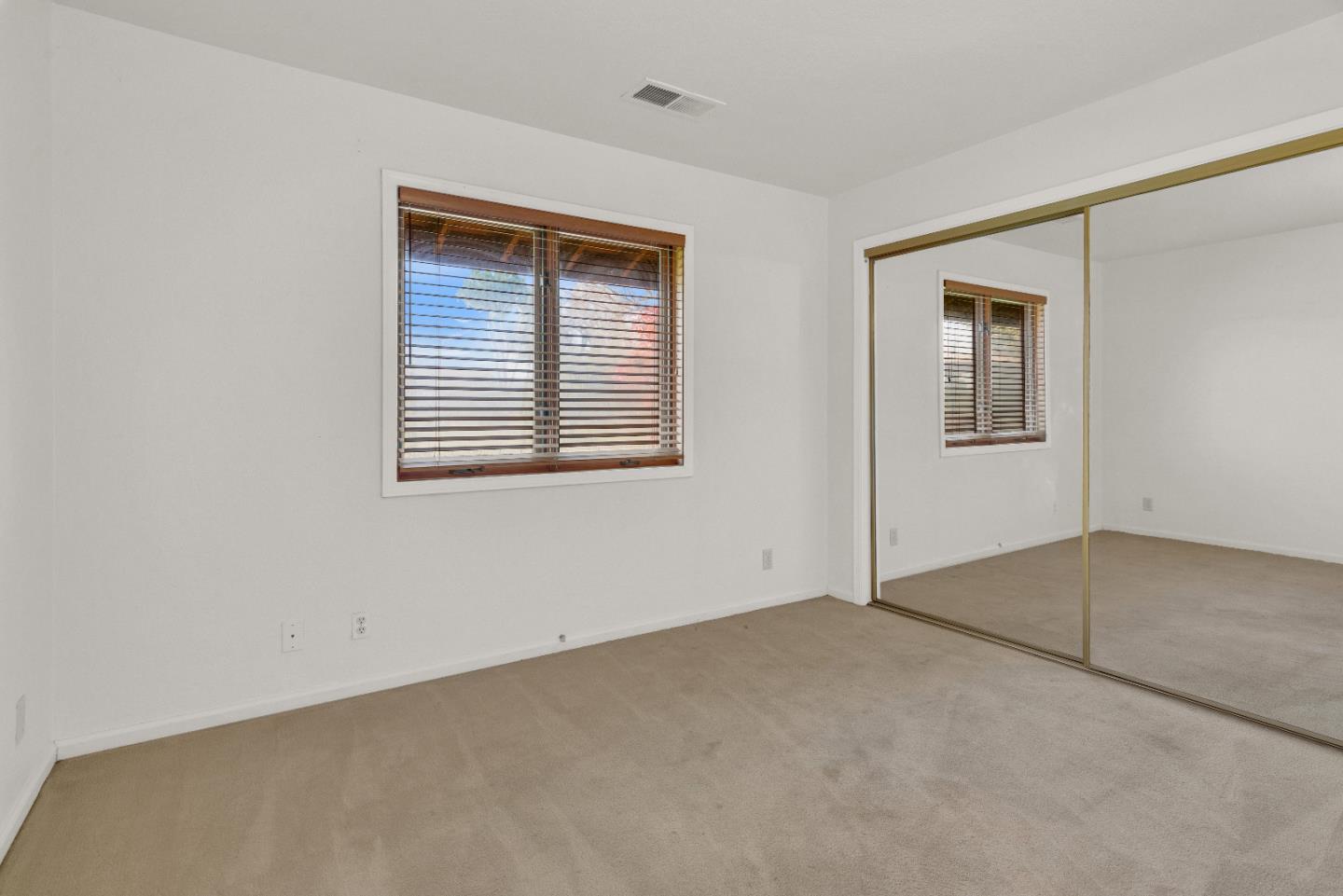 50145 Adobe Place Bradley, CA 93426 - Photo 15 of 39 an empty room with windows