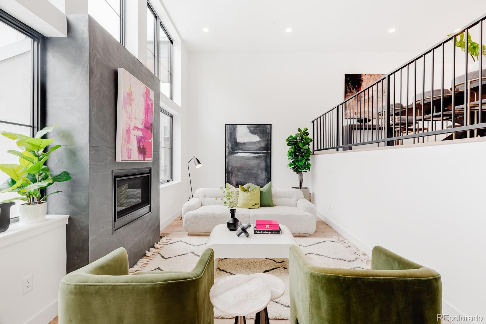 838 Ash Street, Unit 6 Denver, CO 80220 - Photo 1 of 40 a living room with furniture and a potted plant