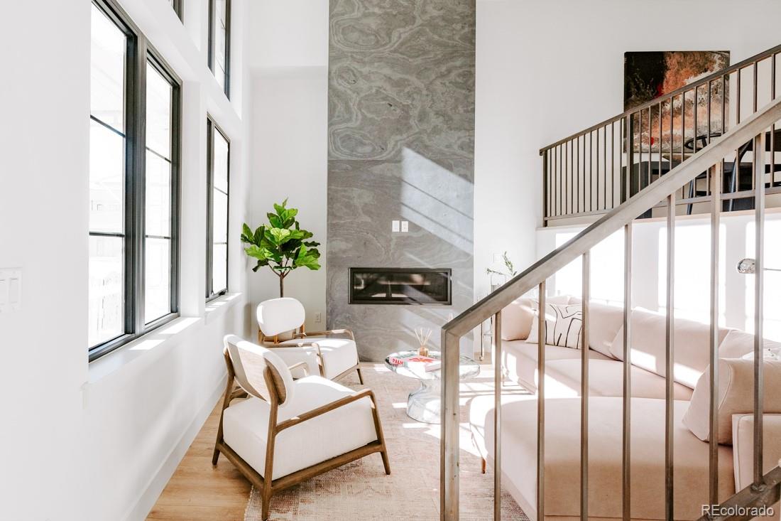 838 Ash Street, Unit 6 Denver, CO 80220 - Photo 11 of 40 a view of living room with furniture and a potted plant