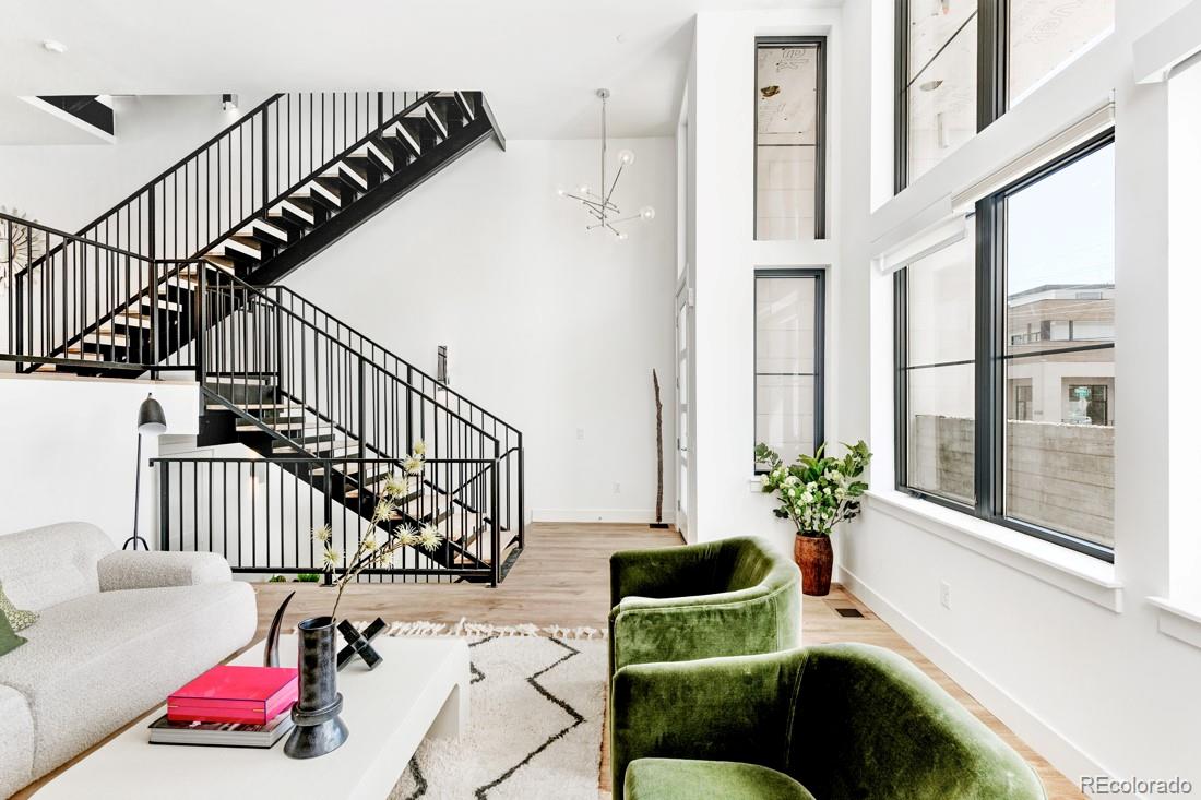 838 Ash Street, Unit 6 Denver, CO 80220 - Photo 18 of 40 a living room with furniture and flowers