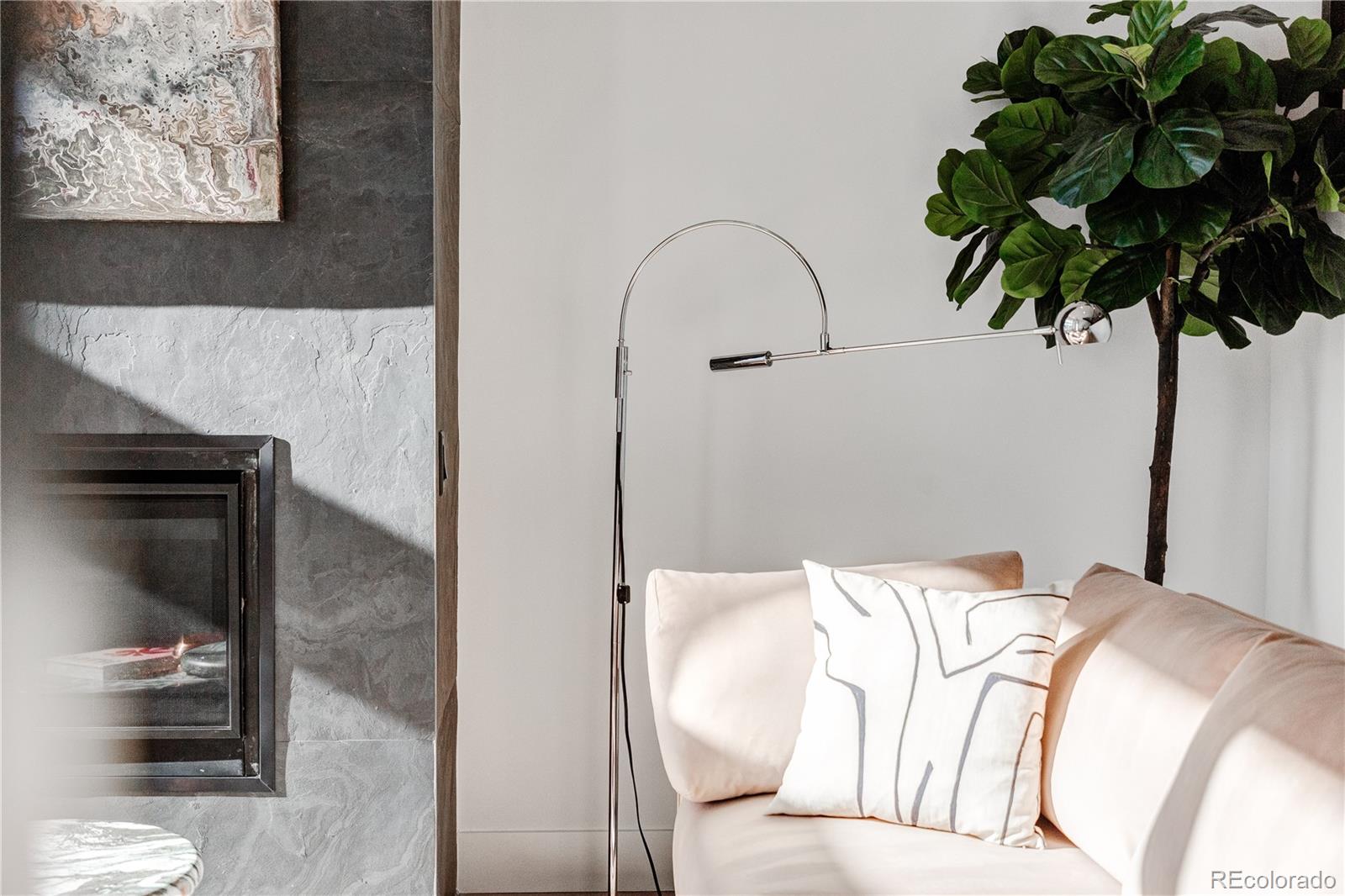 838 Ash Street, Unit 6 Denver, CO 80220 - Photo 27 of 40 a bedroom with a bed and a potted plant