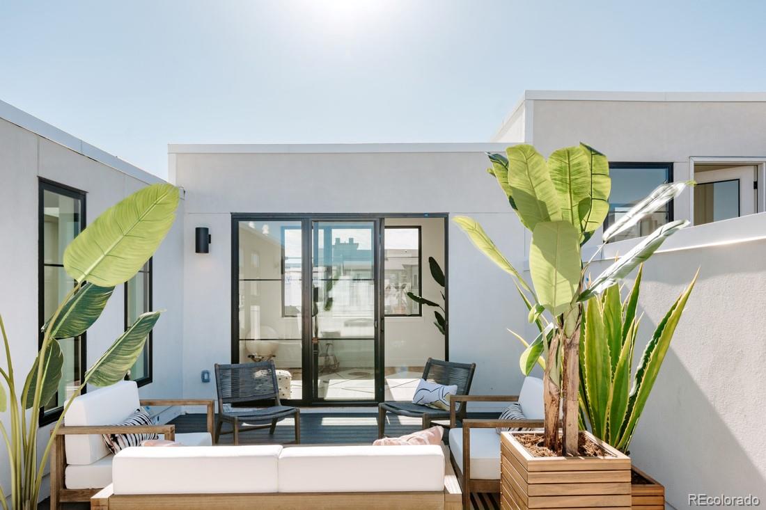 838 Ash Street, Unit 6 Denver, CO 80220 - Photo 29 of 40 a view of living room with furniture and potted plants