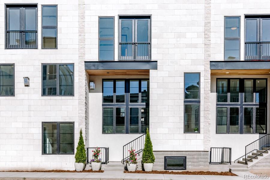 838 Ash Street, Unit 6 Denver, CO 80220 - Photo 33 of 40 a front view of a building with a window and a window