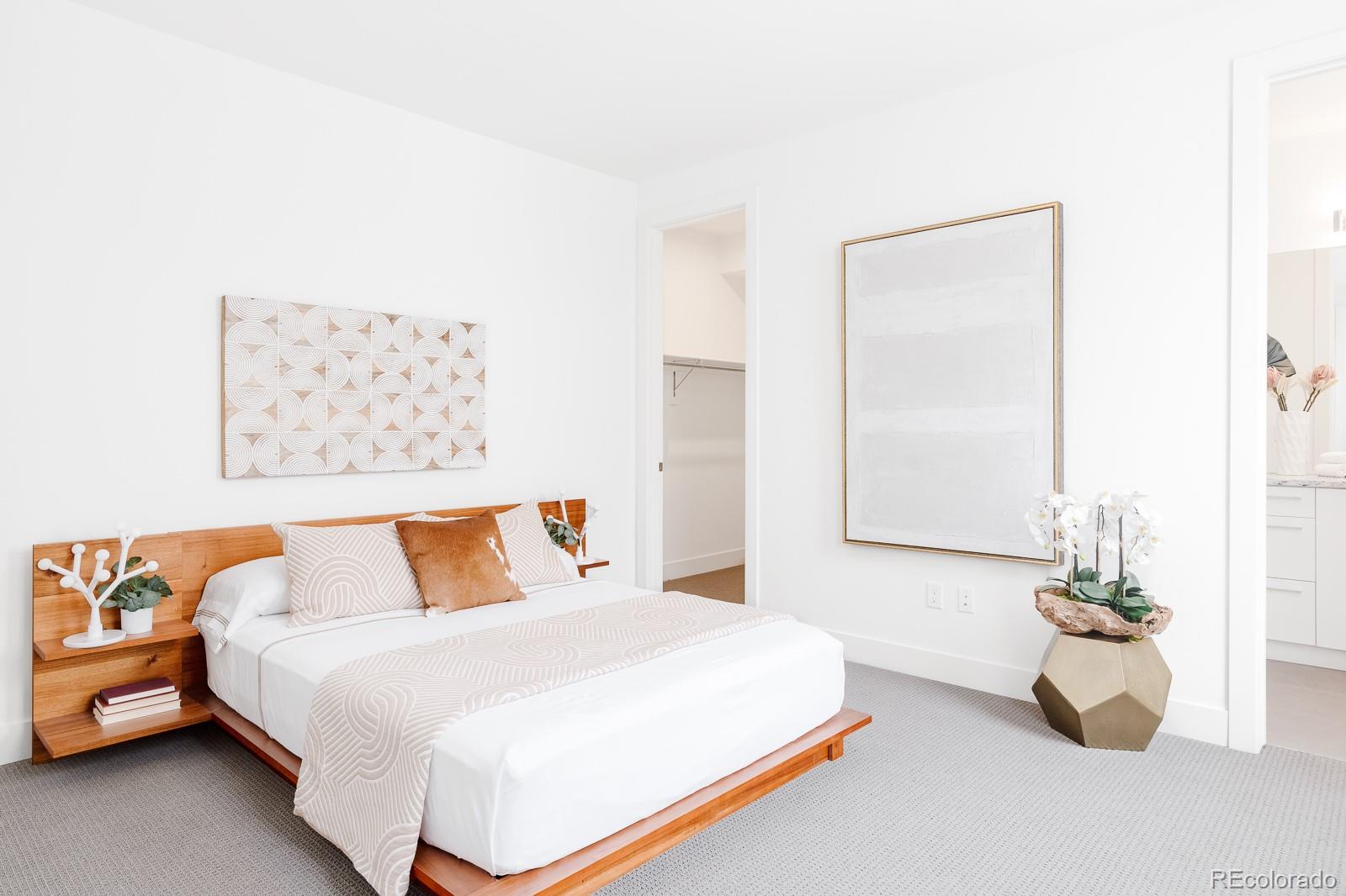 838 Ash Street, Unit 6 Denver, CO 80220 - Photo 8 of 40 a bedroom with a bed and a table