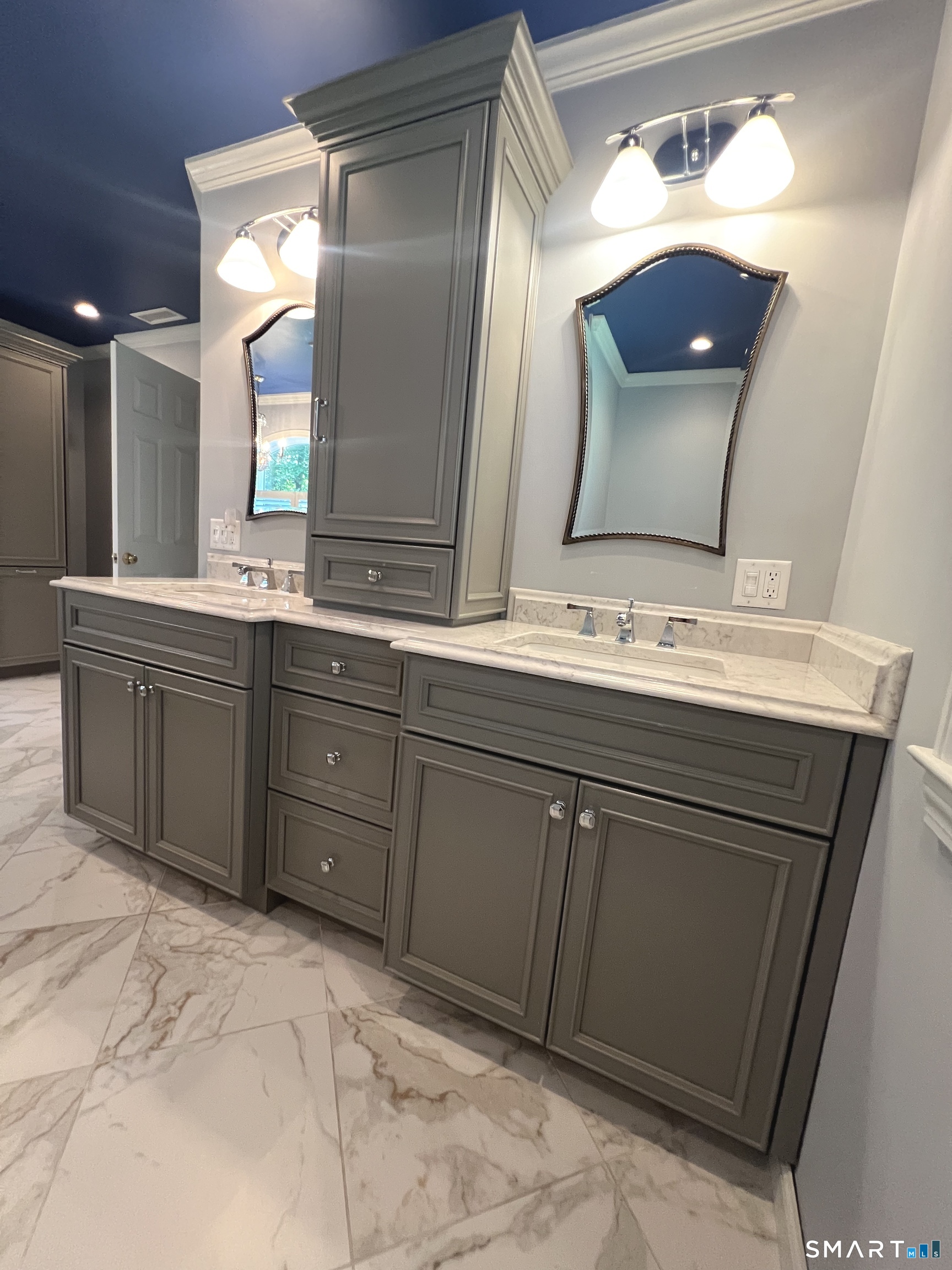 60 West Meadow Road Hamden, CT 06518 - Photo 25 of 37 Two separate vanities offer plenty of personal space and storage in the elegant primary bath.