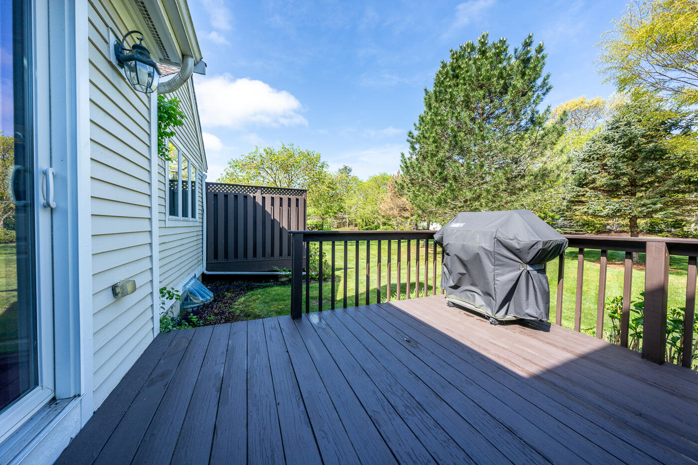 5 Classic Circle Mashpee, MA 02649 - Photo 17 of 18 a view of a deck with wooden floor and outdoor space