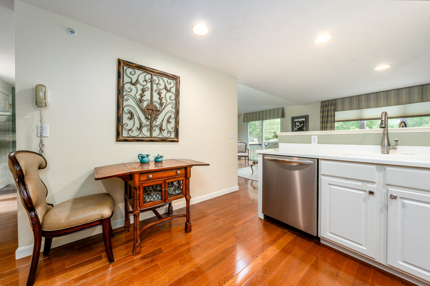 5 Classic Circle Mashpee, MA 02649 - Photo 8 of 18 a kitchen that has a sink a table and chairs in it