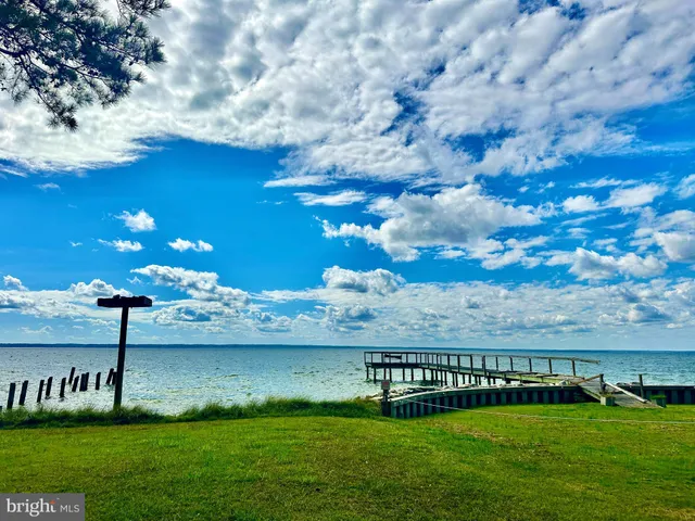 a view of building with outdoor space and seating
