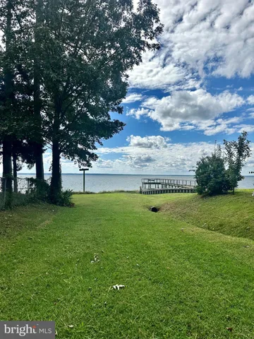 a view of a garden and basketball court