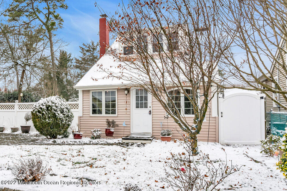 51 Dock Road Brick, NJ 08723 - Photo 3 of 57 a view of a house with a yard covered in snow