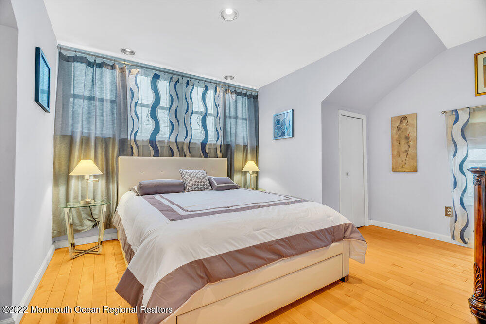 51 Dock Road Brick, NJ 08723 - Photo 45 of 57 a bed sitting in a bedroom next to a window