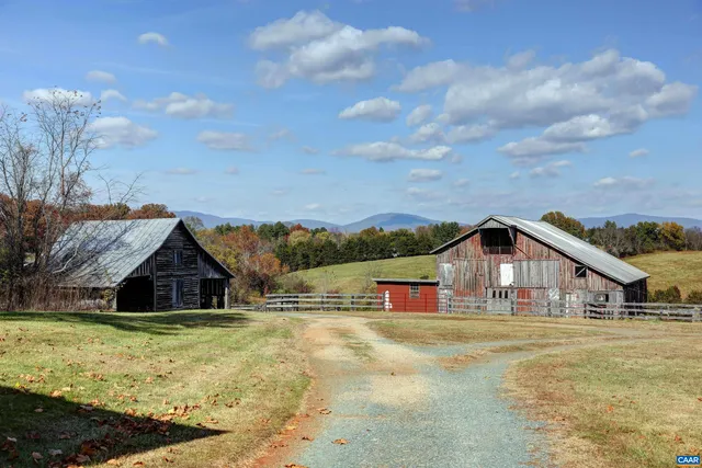 a terrace of a house with outdoor seating