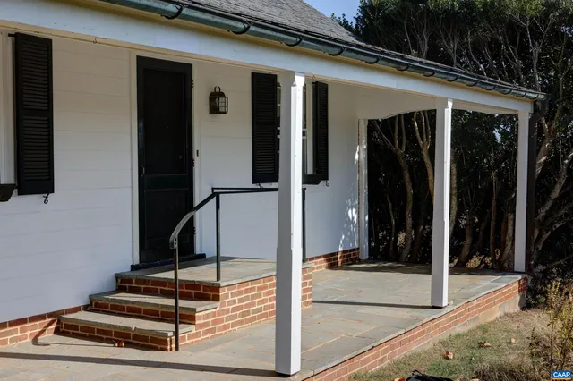 a view of a entryway door front of house