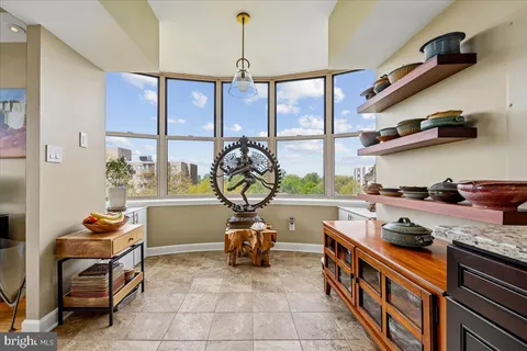 a bathroom with a sink a vanity and a mirror
