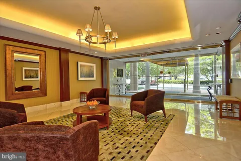 a outdoor space with lots of furniture and wooden floor