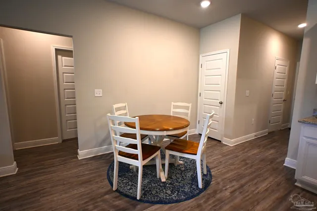 a room with lots of different kinds of flowers