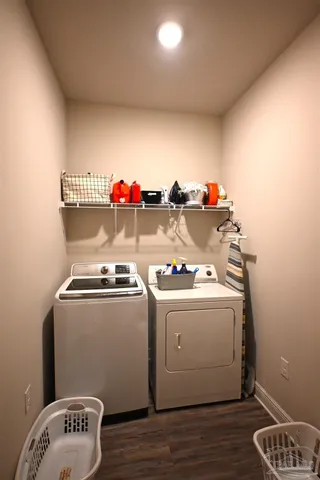 a view of a chairs and table in the balcony
