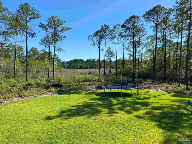 a fire hydrant in the middle of a field