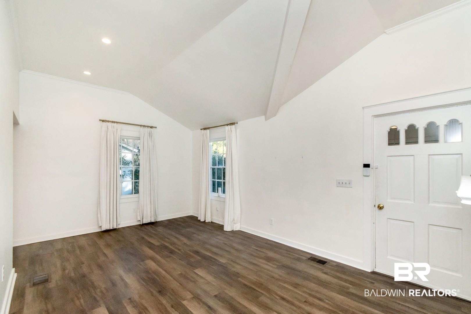 16 Princess Anne Road Mobile, AL 36608 - Photo 3 of 40 Foyer with dark wood finished floors, recessed lighting, and vaulted ceiling