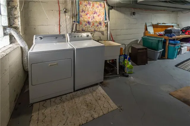 a utility room with dryer and washer