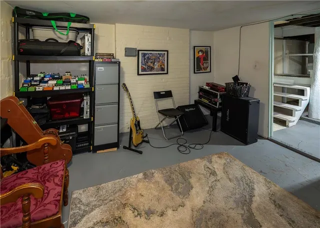 a view of a workspace with furniture