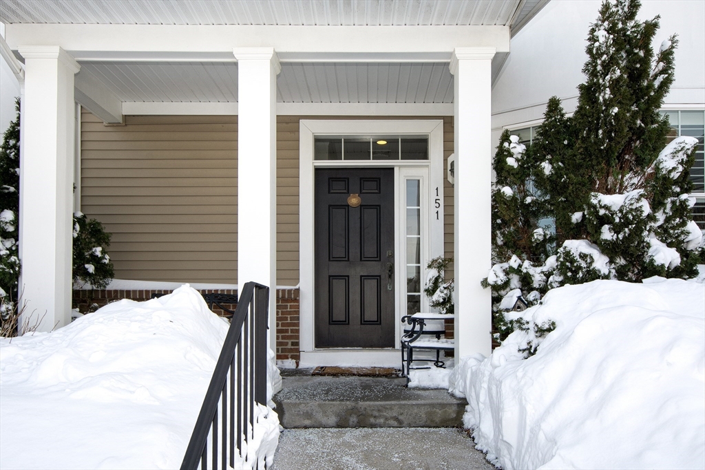 151 HMS Stayner Drive, Unit 151 Hingham, MA 02043 - Photo 2 of 42 a view of a house with a potted plant