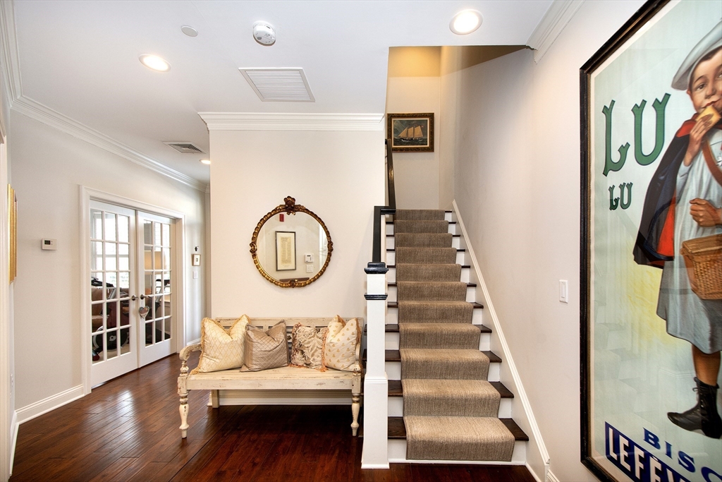 151 HMS Stayner Drive, Unit 151 Hingham, MA 02043 - Photo 9 of 42 a view of entryway with wooden floor
