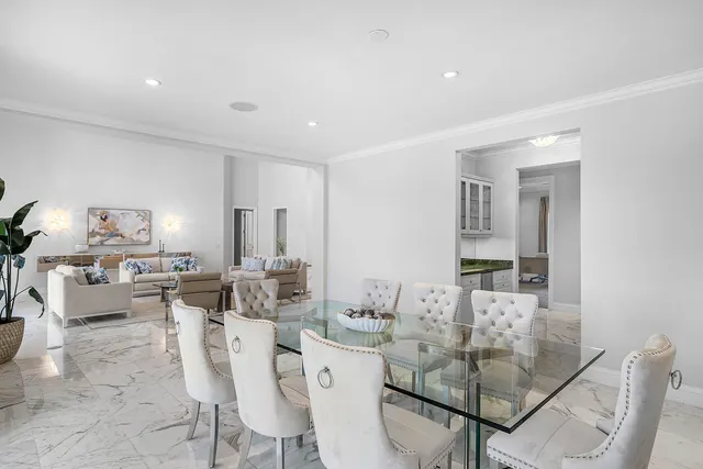 a view of a kitchen with granite countertop a sink and cabinets