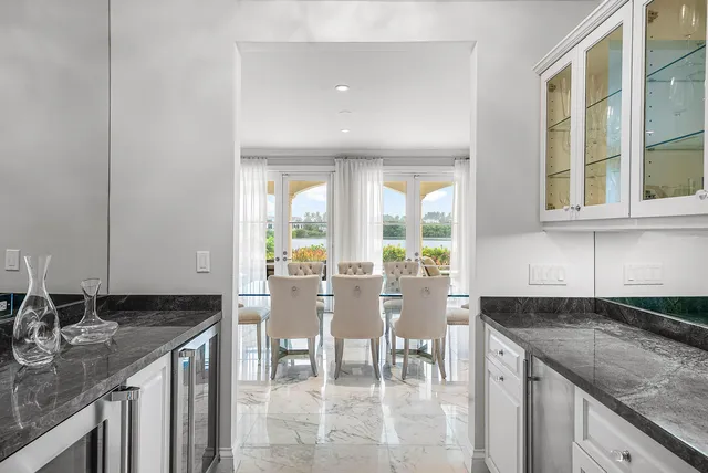 a view of a hallway with seating area