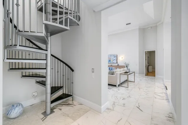 a kitchen with a sink a stove and cabinets