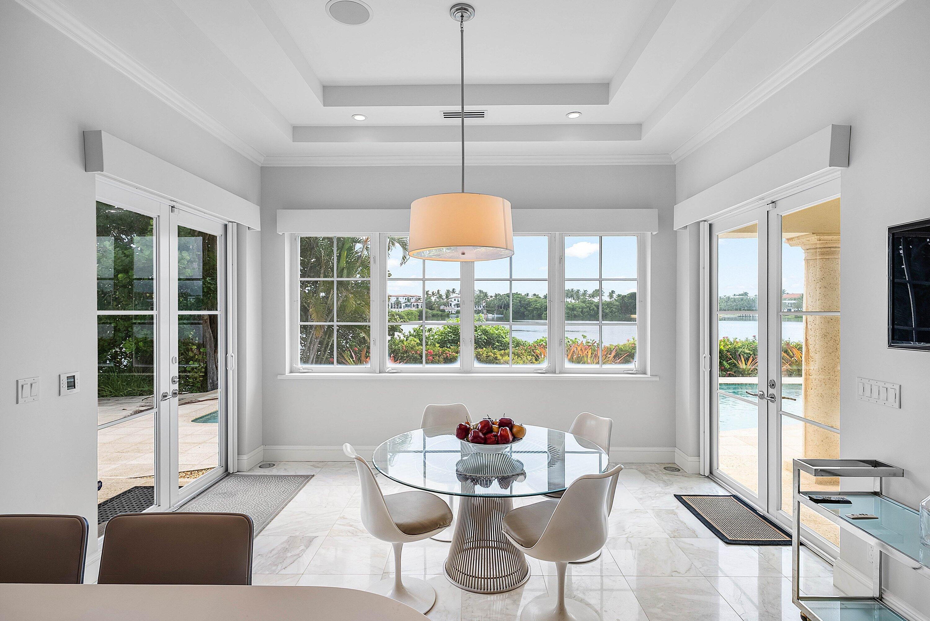 1620 Lands End Road Manalapan, FL 33462 - Photo 16 of 34 a living room with furniture and a large window