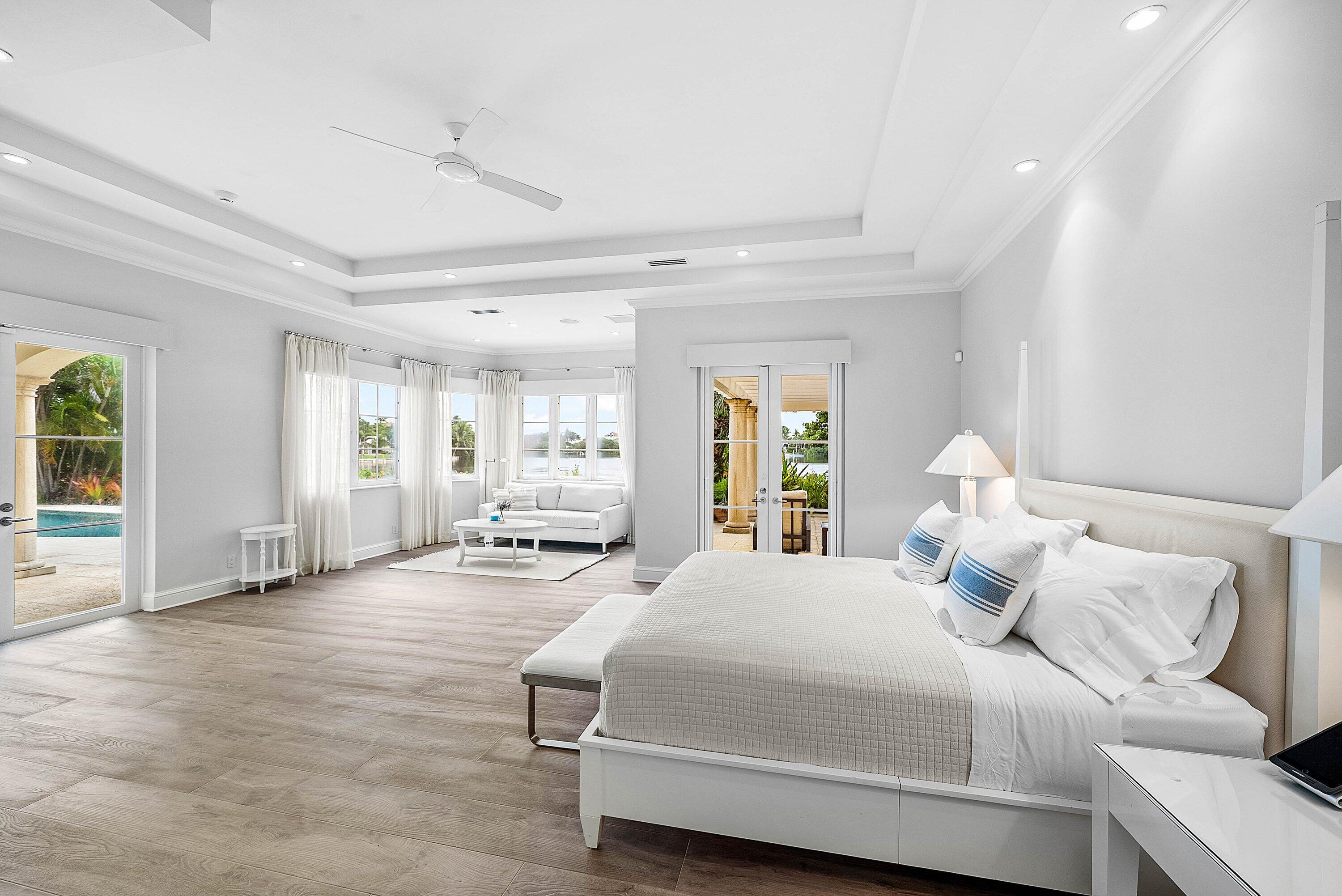 1620 Lands End Road Manalapan, FL 33462 - Photo 19 of 34 a bedroom with a bed and window