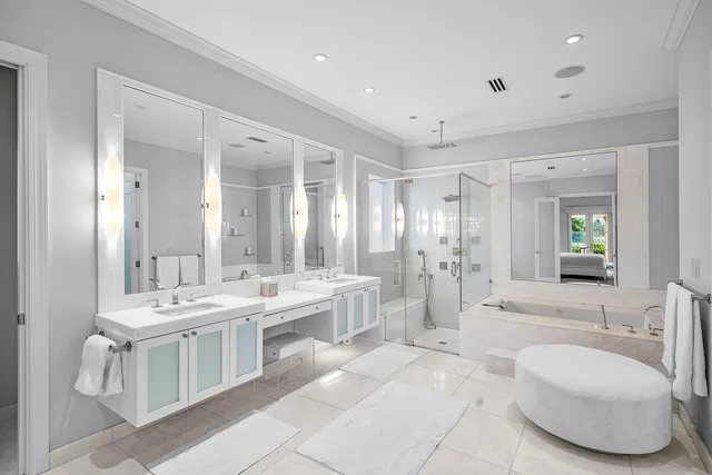 a bathroom with a sink vanity and a mirror
