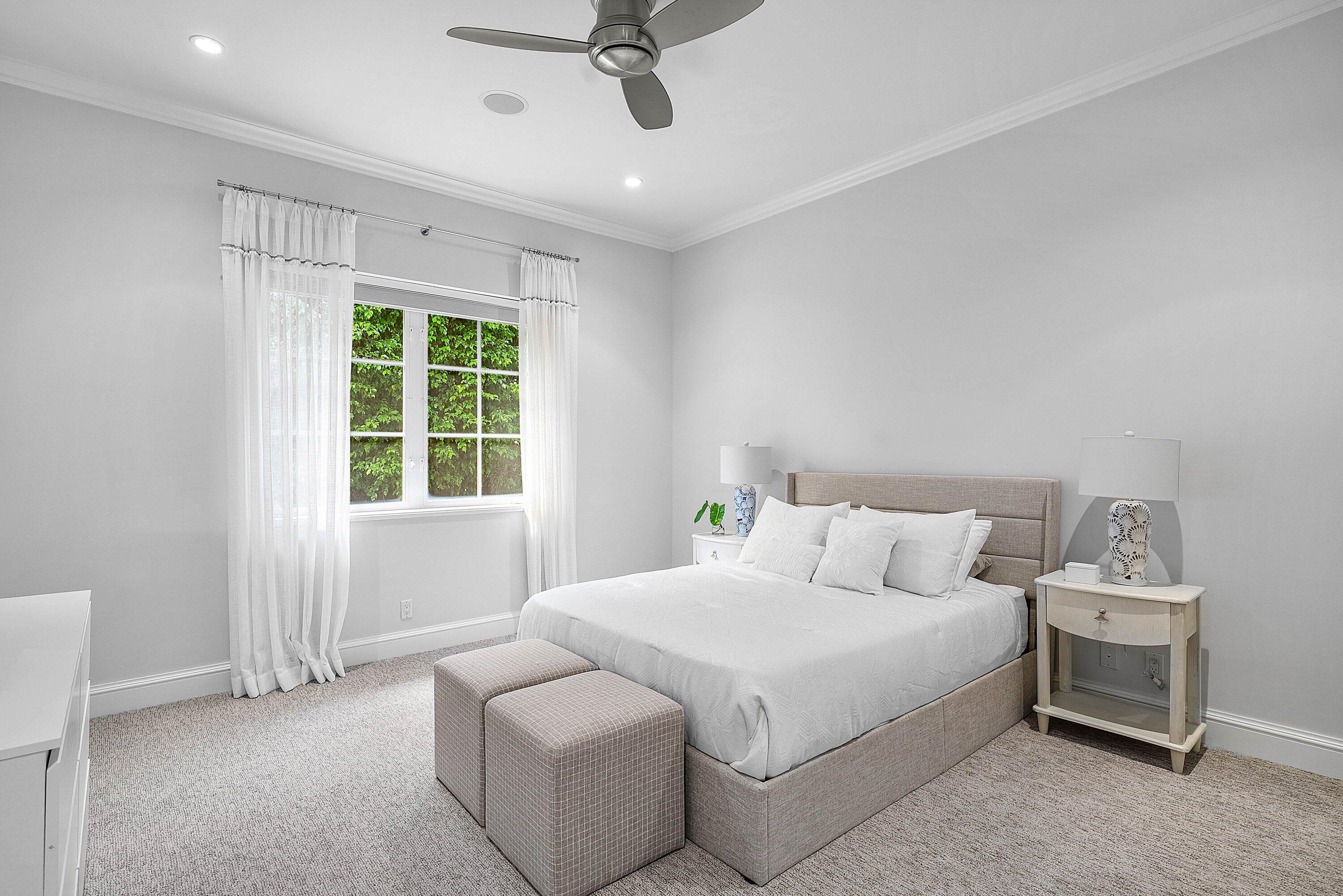 1620 Lands End Road Manalapan, FL 33462 - Photo 23 of 34 a bedroom with bed and window