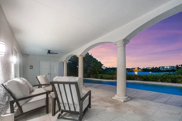 a view of a porch with furniture