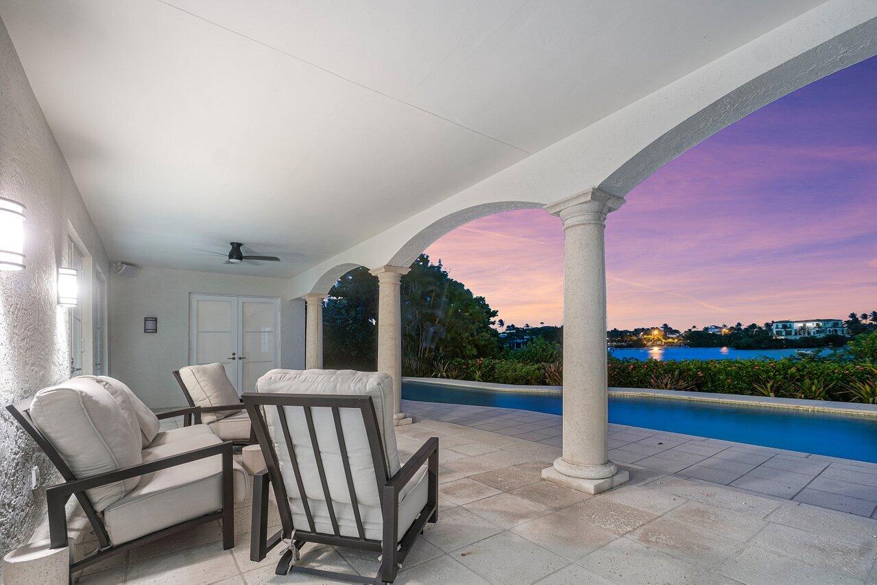 1620 Lands End Road Manalapan, FL 33462 - Photo 3 of 34 a view of a porch with furniture